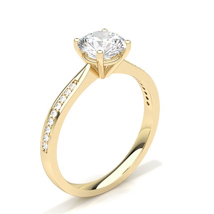 Shouldered Solitaire Yellow Gold Moissanite Ring set with 4 prongs and strapping