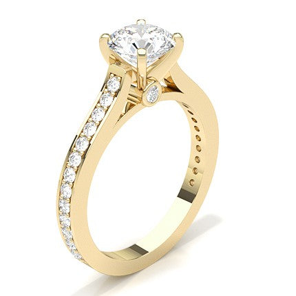 Yellow Gold Ring Moissanite Solitaire set with 4 prongs and shouldered with halo